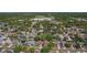 Aerial perspective of the property within a mature neighborhood, near a school and local amenities at 1740 Shady Leaf Dr, Valrico, FL 33596