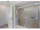 Bathroom featuring a shower and bathtub combination with sliding glass doors at 1740 Shady Leaf Dr, Valrico, FL 33596