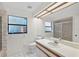 Bathroom featuring a shower, toilet, vanity and tiled flooring at 1740 Shady Leaf Dr, Valrico, FL 33596
