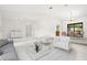 Bright living area with tile entry, carpet and adjacent dining area at 1740 Shady Leaf Dr, Valrico, FL 33596