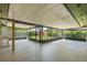 Large screened porch with views of a fenced-in backyard at 1740 Shady Leaf Dr, Valrico, FL 33596