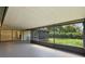 Screened-in porch area featuring a spacious area to enjoy the outdoors at 1740 Shady Leaf Dr, Valrico, FL 33596