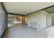 Open and airy screened-in porch features access to both the yard and house at 1740 Shady Leaf Dr, Valrico, FL 33596