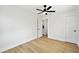 Bright bedroom featuring light wood floors and white walls at 38638 2Nd Ave, Zephyrhills, FL 33542
