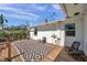 Back porch with deck looking to the yard and the house exterior at 4830 14Th N Ave, St Petersburg, FL 33713