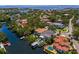Waterfront homes with private docks and lush landscaping along the canal at 5004 S The Riviera, Tampa, FL 33609