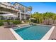 Expansive backyard featuring a sparkling pool, sundeck, lush greenery and a luxurious outdoor space for entertaining at 5004 S The Riviera, Tampa, FL 33609