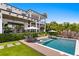 Beautiful backyard showcasing a luxurious pool, spa, lounge chairs, and manicured greenery at 5004 S The Riviera, Tampa, FL 33609