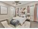 Serene bedroom with a plush rug, soft lighting, and elegant decor for a relaxing retreat at 5004 S The Riviera, Tampa, FL 33609