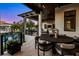 Elegant outdoor dining area with comfortable seating, offering beautiful views and a relaxing atmosphere at 5004 S The Riviera, Tampa, FL 33609