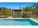 Tranquil pool area with pristine turquoise waters, and a charming gazebo for relaxing by the waterfront at 5004 S The Riviera, Tampa, FL 33609