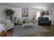 Bright and airy living room with comfortable seating and stylish decor at 6601 Thackston Dr, Riverview, FL 33578