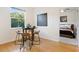 Cozy dining area with table set for four, featuring large windows and views at 1910 E Palm Ave # 10301, Tampa, FL 33605