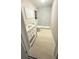 This bathroom features grey tile, a white vanity, and modern fixtures at 211 S Obrien St, Tampa, FL 33609