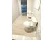 Bathroom with new toilet and vanity, and direct access to the backyard pool at 211 S Obrien St, Tampa, FL 33609