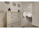 Hallway view of open floor plan featuring dining area, console, and tile floors at 211 S Obrien St, Tampa, FL 33609