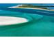 Scenic aerial view of a pristine beach with clear turquoise waters and white sandbars at 2893 Turtle Ter, Palm Harbor, FL 34683