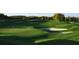 Lush green golf course featuring rolling hills, manicured greens, and sand traps at 2893 Turtle Ter, Palm Harbor, FL 34683
