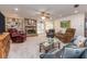 Spacious living room with a brick fireplace, cozy seating, and seamless flow to other areas at 2893 Turtle Ter, Palm Harbor, FL 34683
