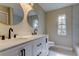 Modern bathroom featuring marble countertops and floor and dual sinks at 2901 Pelham Rd N, St Petersburg, FL 33710