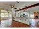 Spacious, updated kitchen featuring a large island with a white countertop and brick flooring at 2901 Pelham Rd N, St Petersburg, FL 33710