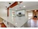 Bright kitchen featuring a large island with white cabinets, stone countertops, and modern lighting at 2901 Pelham Rd N, St Petersburg, FL 33710