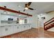 Bright kitchen with modern appliances, white cabinets, and brick floors at 2901 Pelham Rd N, St Petersburg, FL 33710