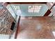 Unique living room with brick walls, skylights, and exposed beams at 2901 Pelham Rd N, St Petersburg, FL 33710