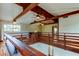 Loft area with exposed beams and hardwood floors at 2901 Pelham Rd N, St Petersburg, FL 33710