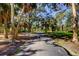 Serene park path lined with trees, perfect for a peaceful walk at 2901 Pelham Rd N, St Petersburg, FL 33710