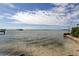 A calm body of water extends to the horizon with a serene view of islands and the distant skyline at 2901 Pelham Rd N, St Petersburg, FL 33710
