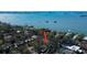 Waterfront property with views of the bay, lush trees, home indicated by arrow at 2901 Pelham Rd N, St Petersburg, FL 33710