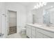 Modern bathroom with double vanity, quartz countertops, tile flooring, and a separate shower at 4219 Big Sky Dr, Spring Hill, FL 34604