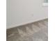 Neutral bedroom features plush gray carpet and large window with blinds at 4219 Big Sky Dr, Spring Hill, FL 34604