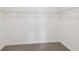 Walk-in closet features durable carpeting and white wire shelving. Ready to store your wardrobe with ease at 4227 Big Sky Dr, Spring Hill, FL 34604