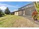 View of the property's backyard and screened in patio at 438 Seneca Falls Dr, Apollo Beach, FL 33572