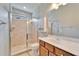 This bathroom features a glass-enclosed shower with modern fixtures at 438 Seneca Falls Dr, Apollo Beach, FL 33572