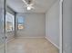 Bright bedroom with neutral paint, a ceiling fan, and a large window at 438 Seneca Falls Dr, Apollo Beach, FL 33572