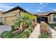 Charming single-story home with a tile roof, two-car garage and a meticulously landscaped yard at 438 Seneca Falls Dr, Apollo Beach, FL 33572