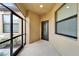 Covered front porch area with a screened entryway, providing a welcoming outdoor space at 438 Seneca Falls Dr, Apollo Beach, FL 33572