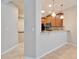 Kitchen featuring granite countertops, wood cabinets, stainless steel appliances, and tile backsplash at 438 Seneca Falls Dr, Apollo Beach, FL 33572