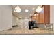 Spacious kitchen with modern appliances, granite countertops, and ample storage at 438 Seneca Falls Dr, Apollo Beach, FL 33572