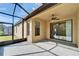 Enjoy the outdoors in this screened patio with tile flooring and access to the home's interior at 438 Seneca Falls Dr, Apollo Beach, FL 33572