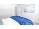 Bright bedroom featuring a queen bed with stylish decor and relaxing wall art at 4541 2Nd N Ave, St Petersburg, FL 33713