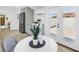 Bright breakfast nook with patio access, features a white table and grey chairs at 4541 2Nd N Ave, St Petersburg, FL 33713