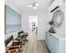 Hallway with neutral colors and decor that leads to the kitchen at 4541 2Nd N Ave, St Petersburg, FL 33713