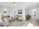 Bright living room featuring modern furniture, hardwood floors, and an open layout at 4541 2Nd N Ave, St Petersburg, FL 33713