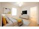 Comfortable bedroom with stylish decor, a large window, and ample space for relaxation at 5511 N 32Nd St, Tampa, FL 33610