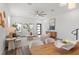 Open concept living and dining area with modern decor and wood flooring at 6207 64Th N Way, Pinellas Park, FL 33781