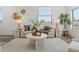 Bright living room with modern furniture, stylish decor, wood flooring, and natural light at 6207 64Th N Way, Pinellas Park, FL 33781